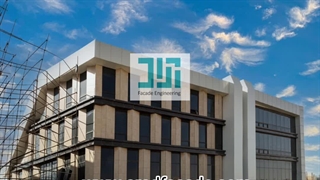 اجرای نمای سرامیک و کرتین وال ساختمان کاوش | شرکت آراد