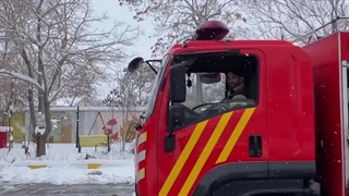 هنرنمایی آتش نشانان اراکی در برف