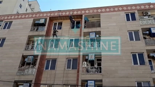 پیچ و رولپلاک نمای ساختمان با نماشاین